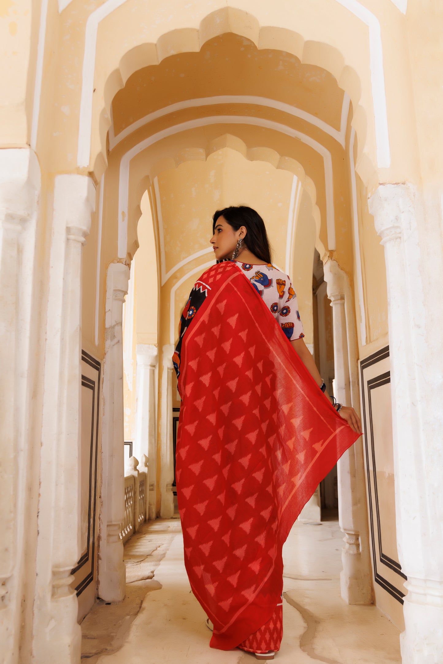 Red and Black Hand Figures Printed Saree