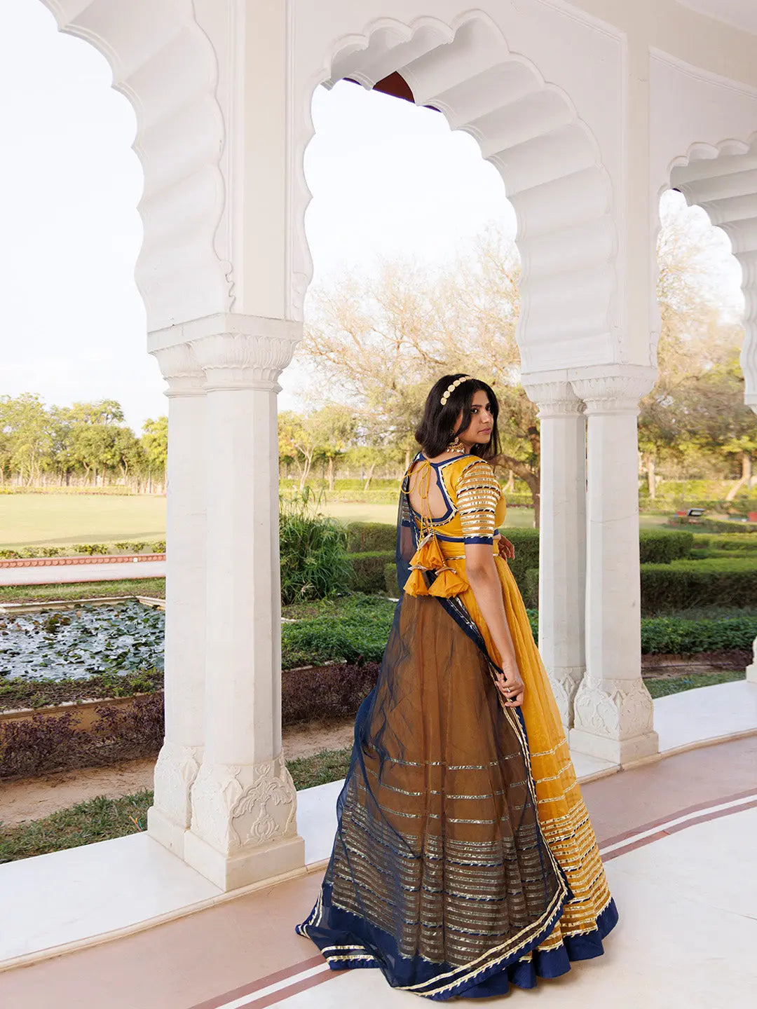 Sunset Gold Yellow and Navy Blue Lehenga Set RAGAVI