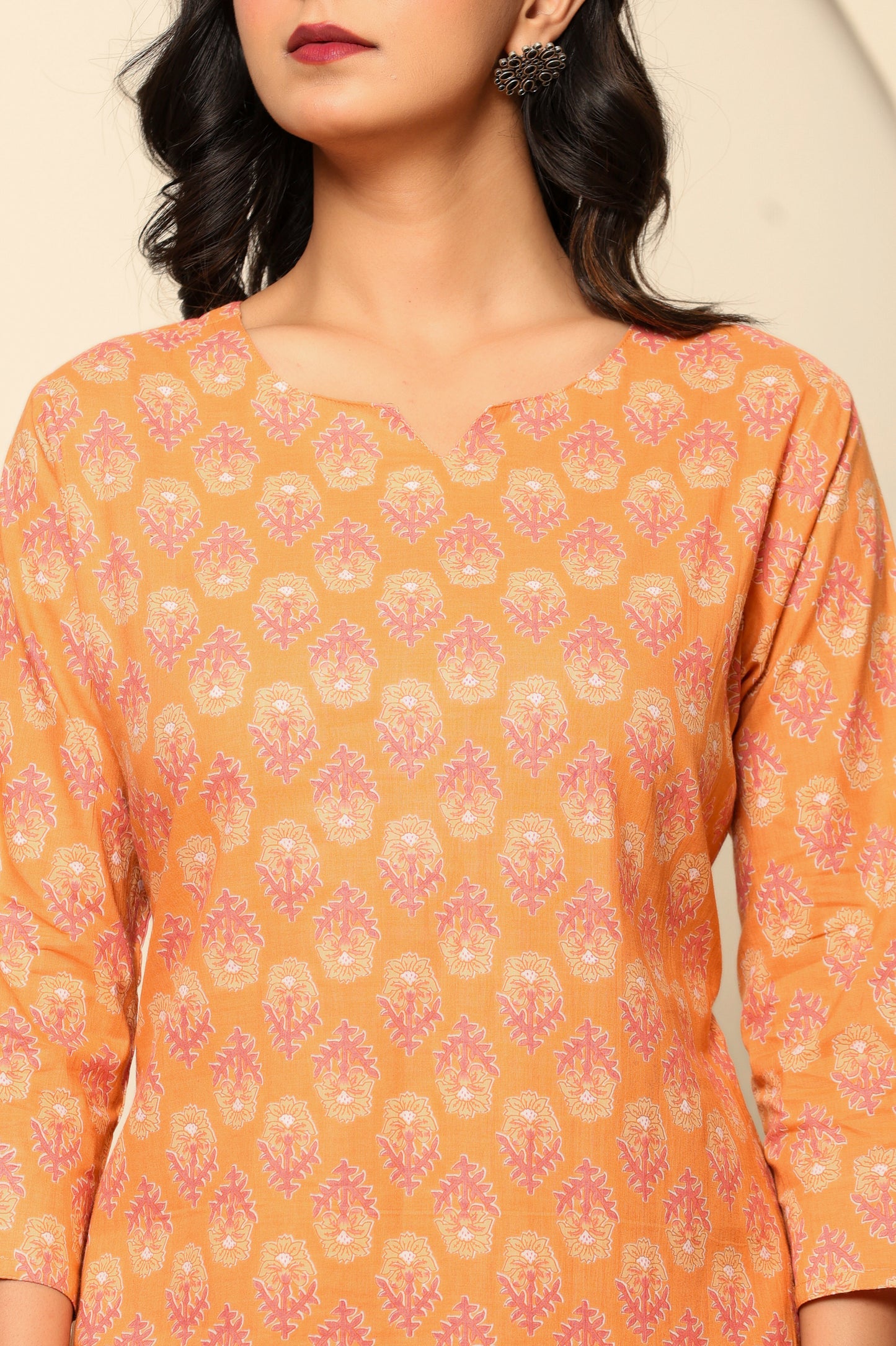 Close-Up of Peach Floral Print on Cotton Fabric