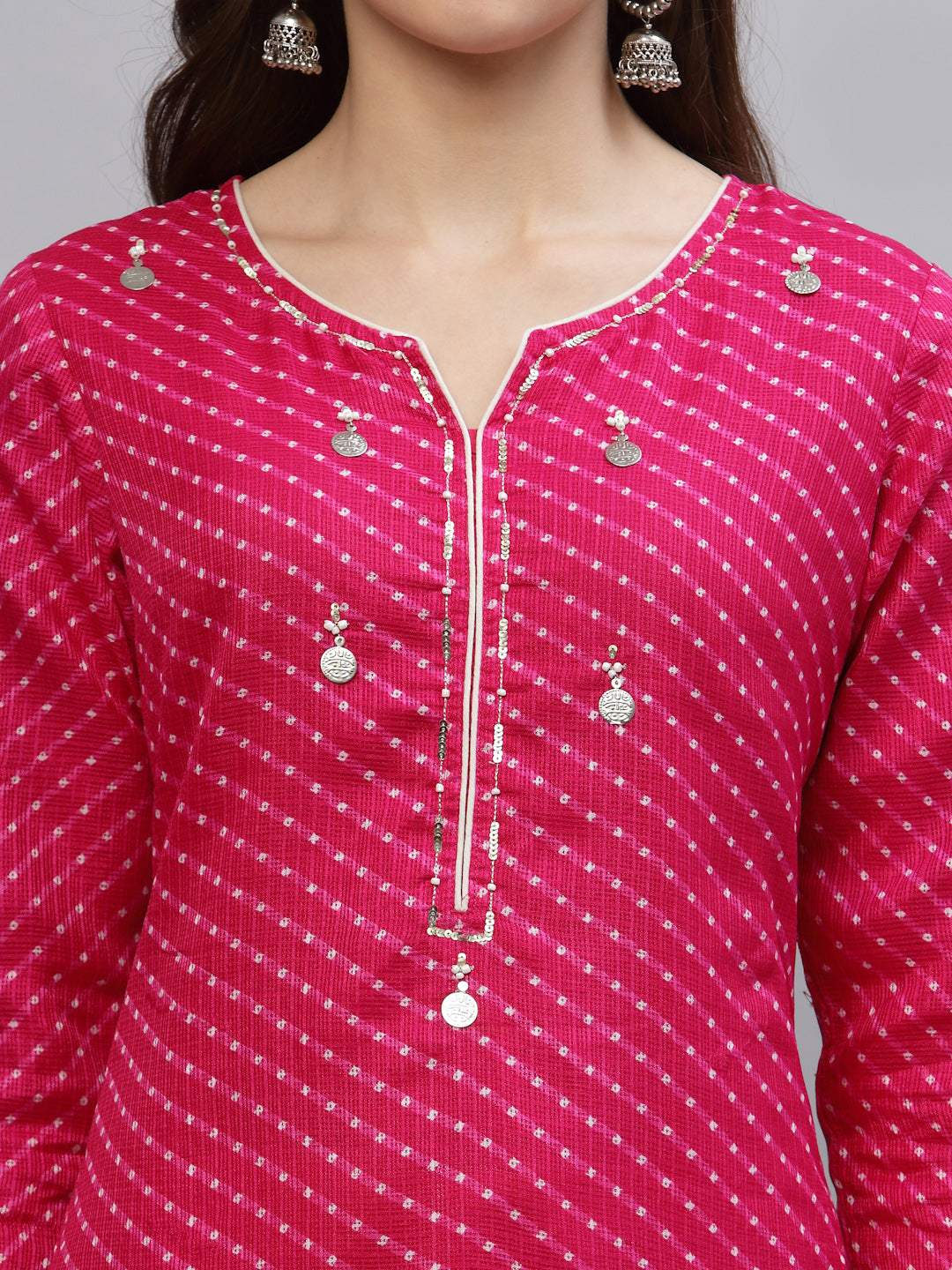 Close-up of V-neck and sleeve design on Pri Pink Leheriya Kurti