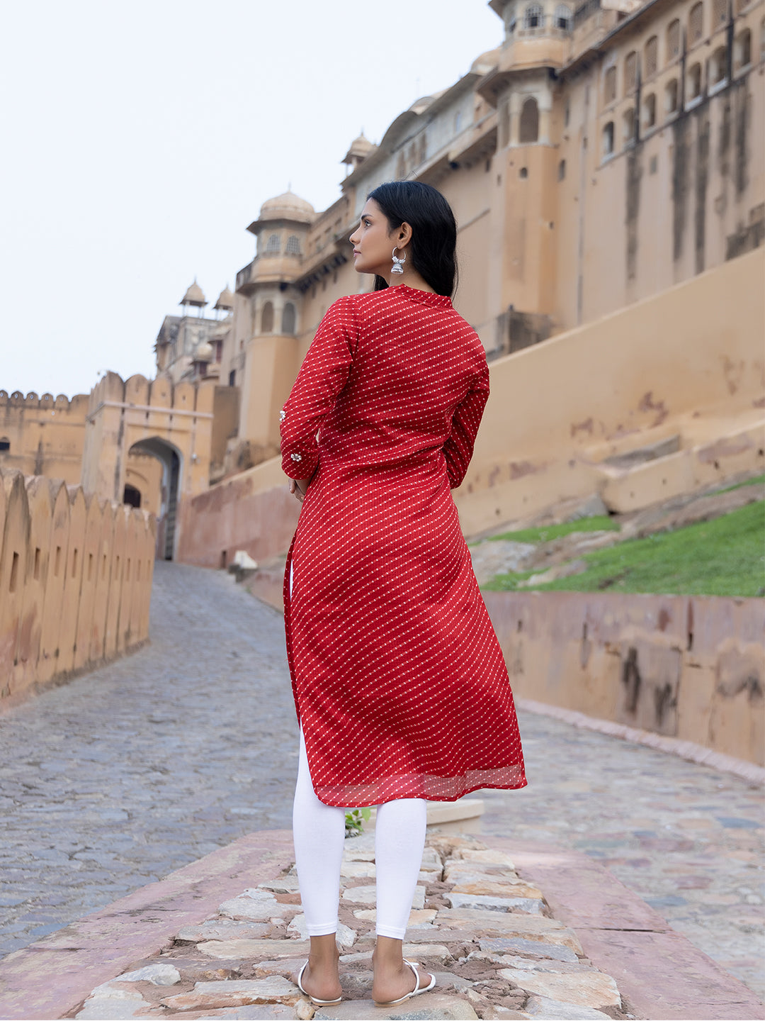 Back view of Zoya Red Leheriya Kurta with tie-dye print