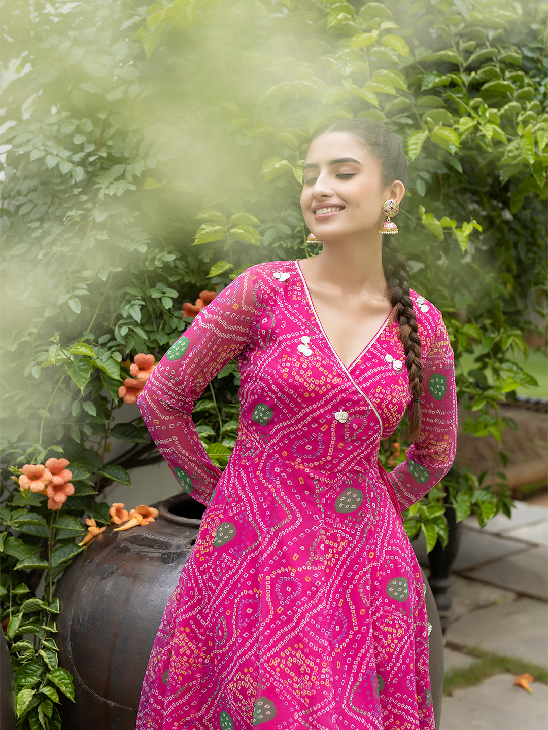 Close-up of V-neck design on pink Leheriya kurta