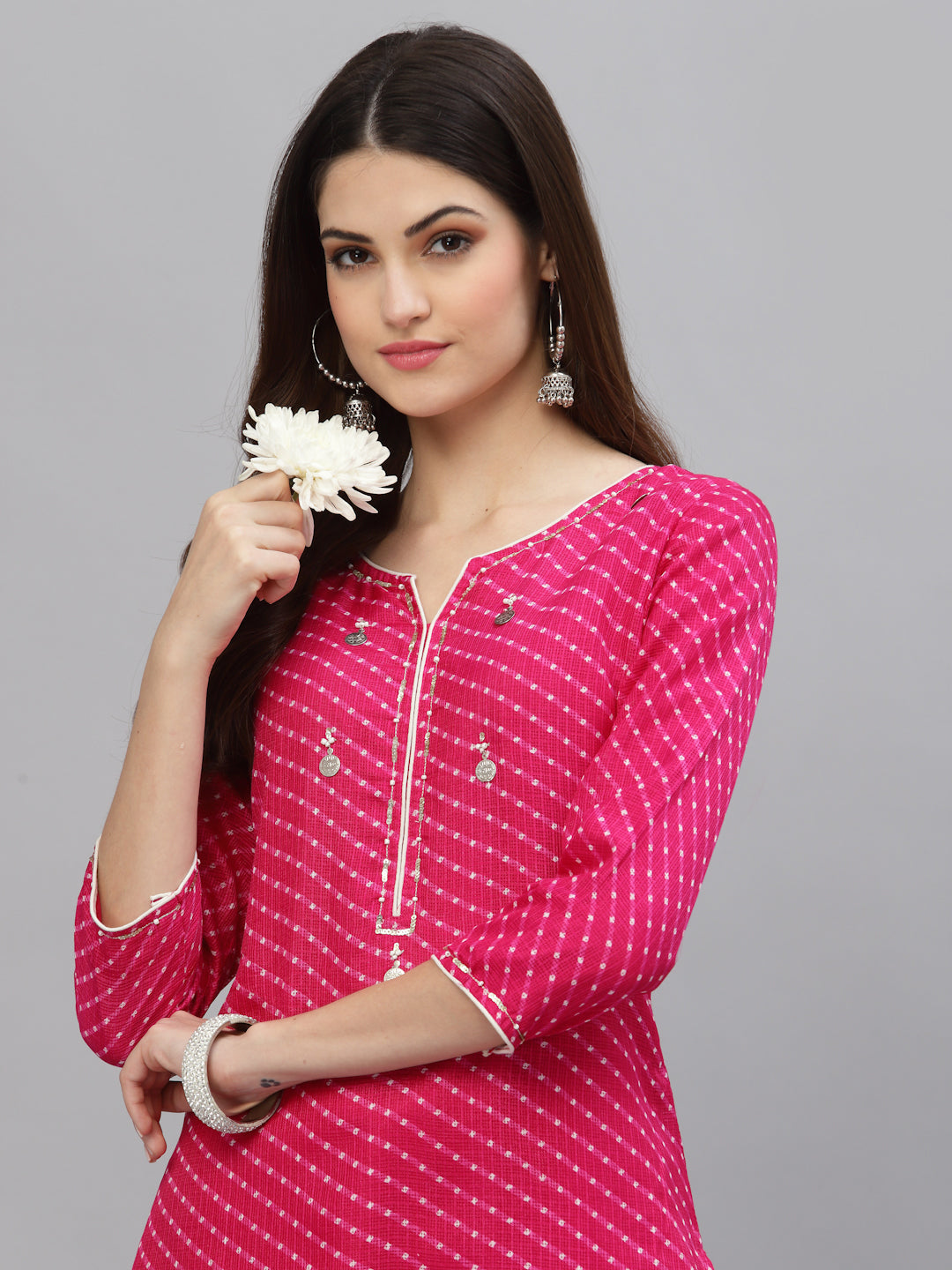 Close-up of V-neck and sleeve design on Pri Pink Leheriya Kurti